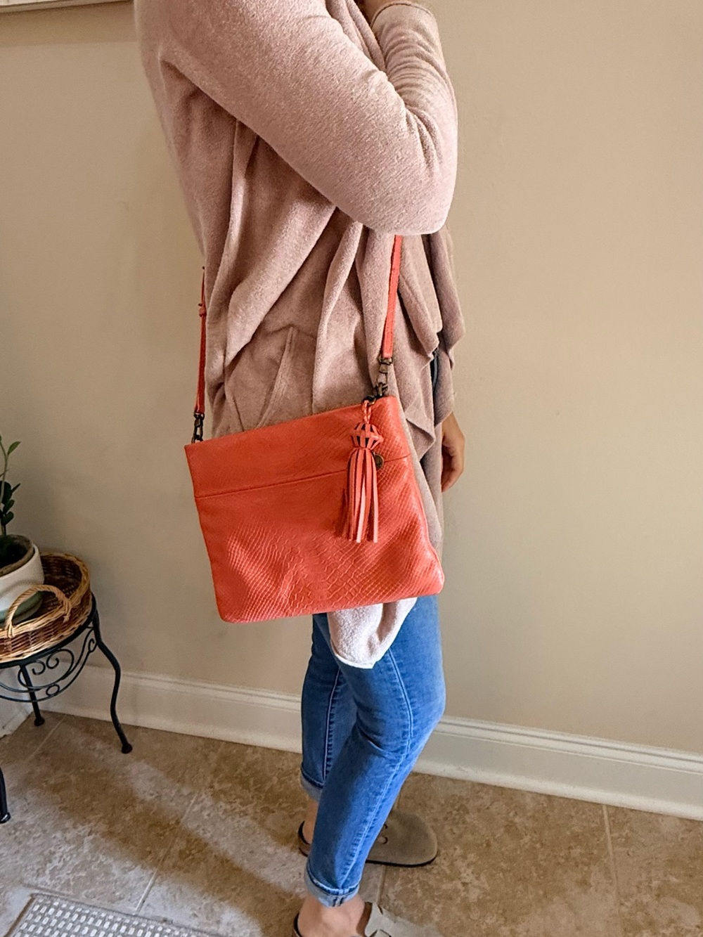 The Sak Coral Orange Crossbody with Tassel